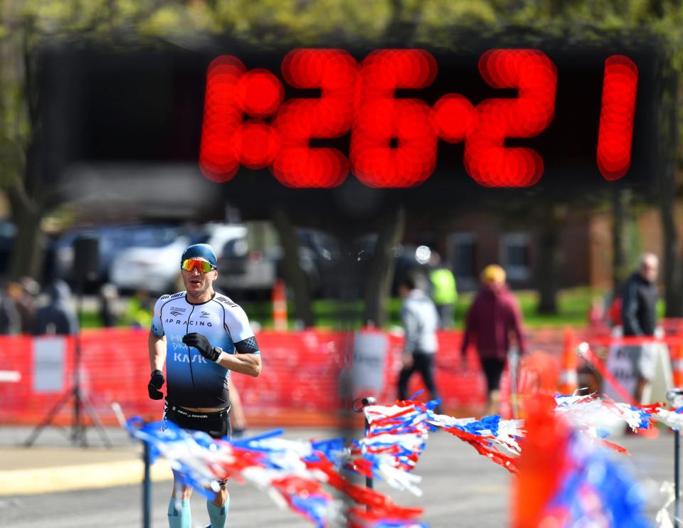 Andrew Zabel approaches the finish line for a first place finish in the long course during the Apple Duathlon Saturday, May 21, 2022, in Sartell.