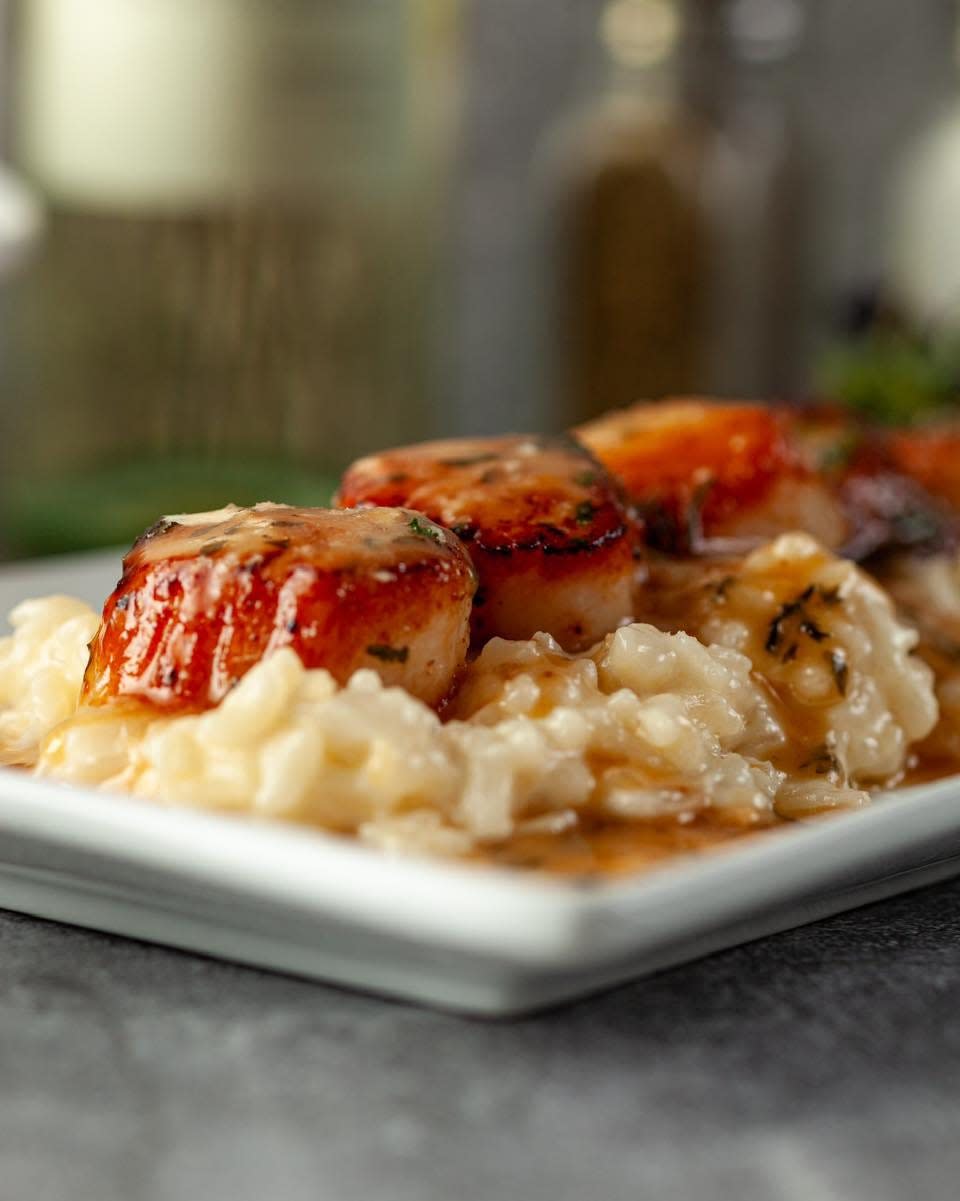 All month long you can try the Bacon Jam Scallops over Lobster Risotto at Fay's Restaurant & Bar.