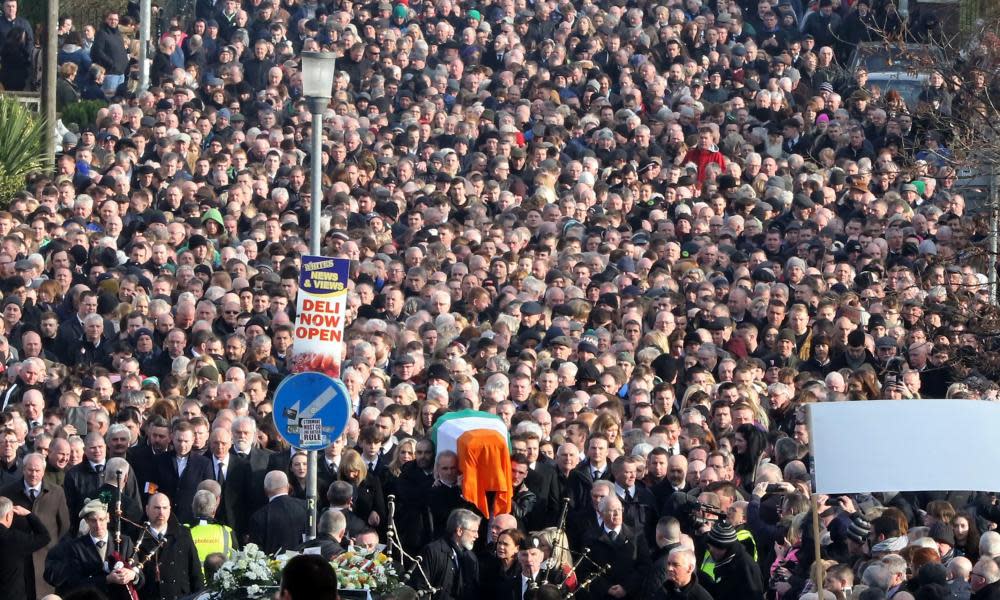 <span class="element-image__caption">Tens of thousands join the funeral cortege in Derry on Thursday. </span> <span class="element-image__credit">Photograph: Paul Faith/AFP/Getty Images</span>