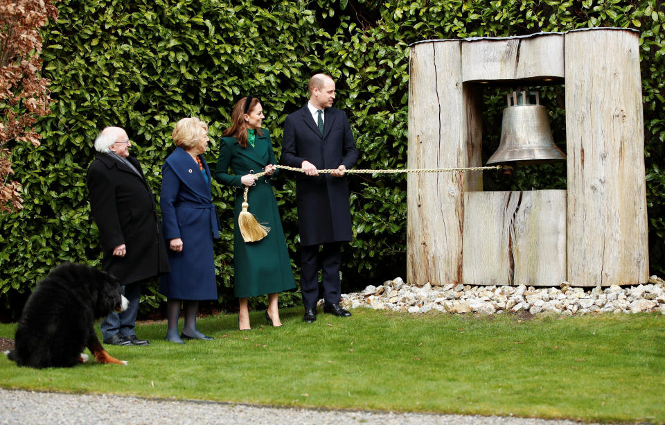 The Duke and Duchess of Cambridge ring the Peace Bell as they meet with the President of Ireland, Michael D. Higgins and his wife Sabina Coyne at Aras an Uachtarain, Dublin, during their three day visit to the Republic of Ireland.