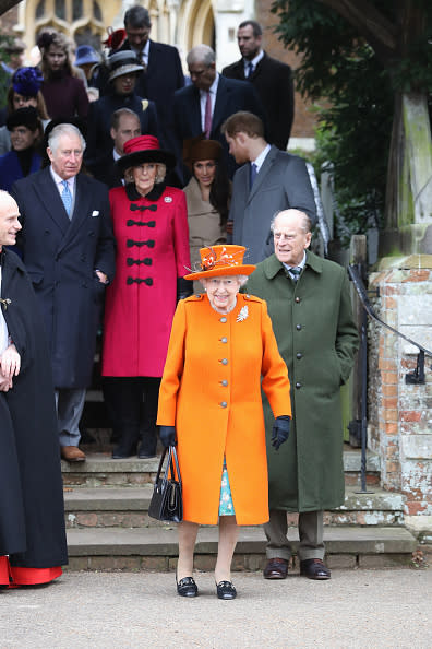 <p>The royal family followed behind the Queen while leaving church. The monarch stood out from the royal crowd in a neon orange coat and hat.</p>