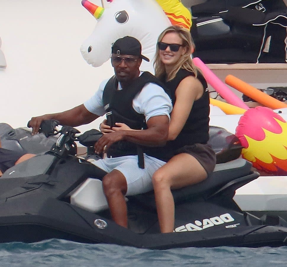 Jamie Foxx boards a jet ski in France