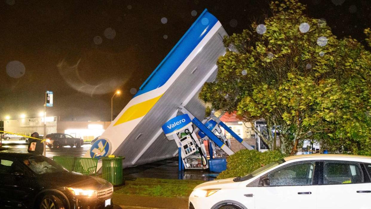 TOPSHOT - A damaged Valero gas station creaks in the wind during a massive 