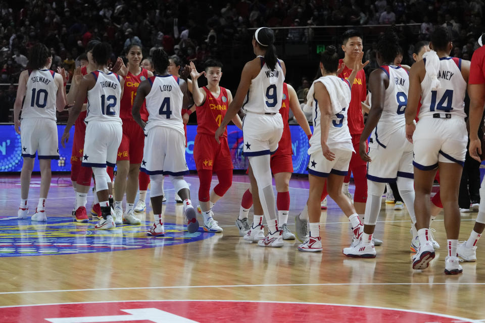 United States players are congratulated by China following their game at the women's Basketball World Cup in Sydney, Australia, Saturday, Sept. 24, 2022. (AP Photo/Mark Baker)