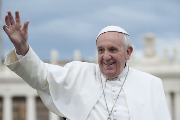 Vatican City - November 13: Pope Francis on the pope mobile bless faithful in St. Peter's Square on November 13 2013