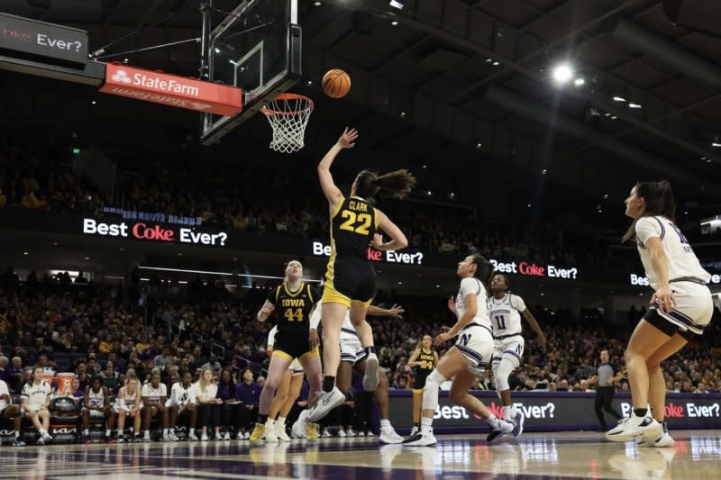 Iowa guard Caitlin Clark scores a basket against Northwestern on Wednesday in Evansville, Ind. Photo courtesy of Hawkeyessports.com