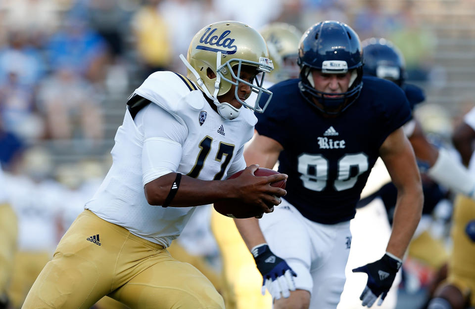 Brett Hundley of the UCLA Bruins runs for a 72 yard touchdown in the first quarter of the game against the Rice Owls at Rice Stadium on August 30, 2012 in Houston, Texas. (Photo by Scott Halleran/Getty Images)