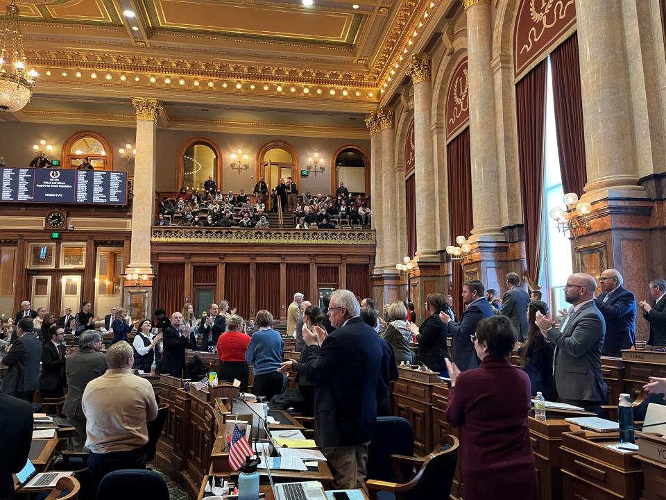 Iowa House Republicans applaud after passing a resolution affirming the chamber's "support and unwavering commitment to the welfare, security and survival of the state of Israel" at the Iowa State Capitol on Thursday, Jan. 18, 2024.
