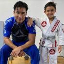 <p>This father-son duo is getting into fighting shape, literally! In this photo, Lopez and his son Dominic are seen posing after completing a Jiu-Jitsu workout together. </p>