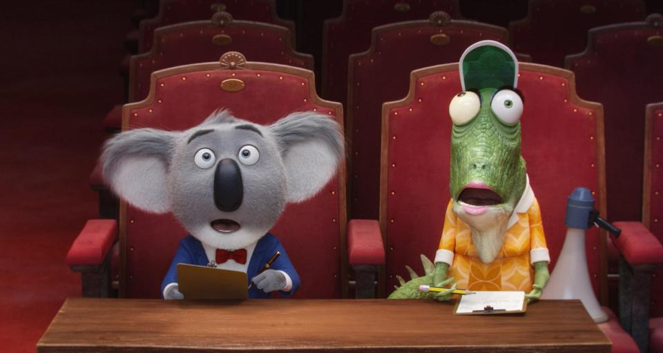 This image released by Universal Pictures shows the character Buster, voiced by Matthew McConaughey, left, and Miss Crawly, voiced by Garth Jennings from the animated film, "Sing." (Universal Pictures via AP)
