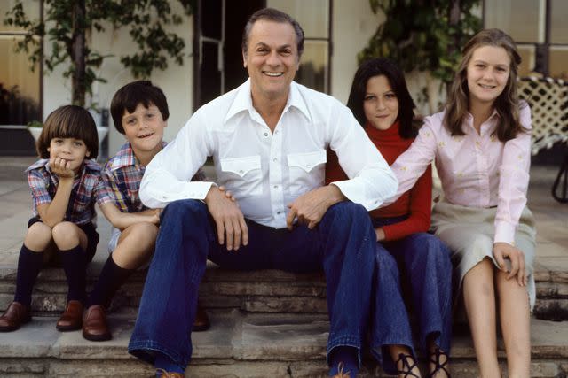 <p>A. Schorr/ullstein bild/Getty</p> Tony Curtis with his children Ben, Nicolas, Allegra and Alexandra in 1979.