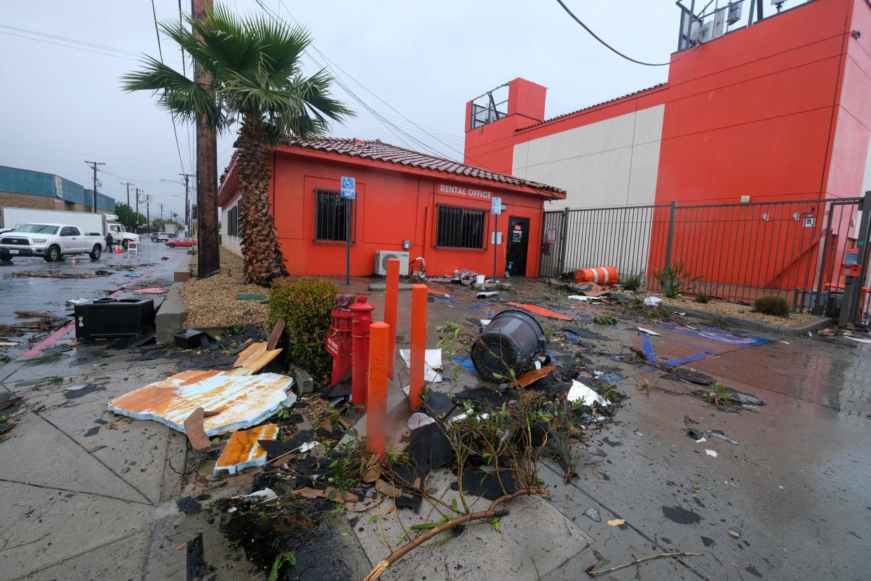 Debris is seen after a possible tornado which damaged several buildings Wednesday, March 22, 2023 in Montebello, Calif.