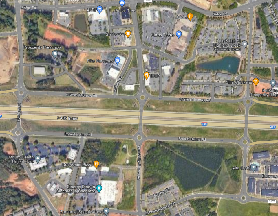 This aerial shows the vision planned by Warren Burgess in the 1990s to have more a street grid network off of Interstate 485 in north Charlotte with roundabouts. Google Maps screenshot