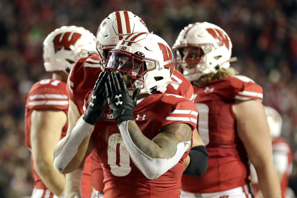 Wisconsin's Braelon Allen gestures after scoring a touchdown during overtime of an NCAA college football game against Nebraska Saturday, Nov. 18, 2023 in Madison, Wis. (AP Photo/Aaron Gash)