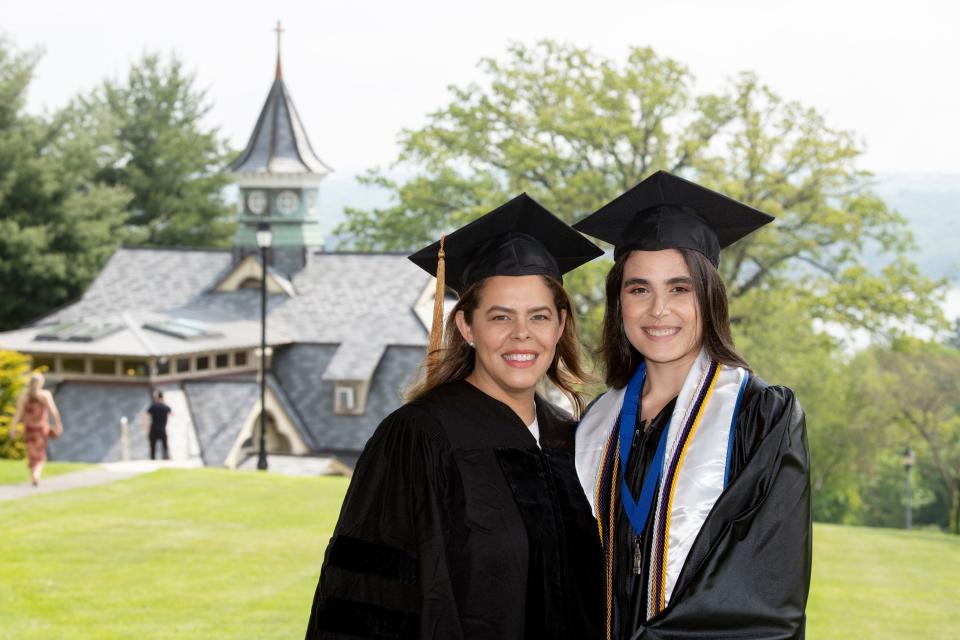 Mount Saint Mary College’s 59th annual Commencement, Saturday, May 21. Left to right: Commencement speaker Karina Cabrera Bell, Class of '01, a Mount alumna, a Fortune 500 executive, and a former official in the Obama White House; and Victoria Veloz-Vicioso of Englewood, a Mount Business major and president of the college’s Latino Student Union.