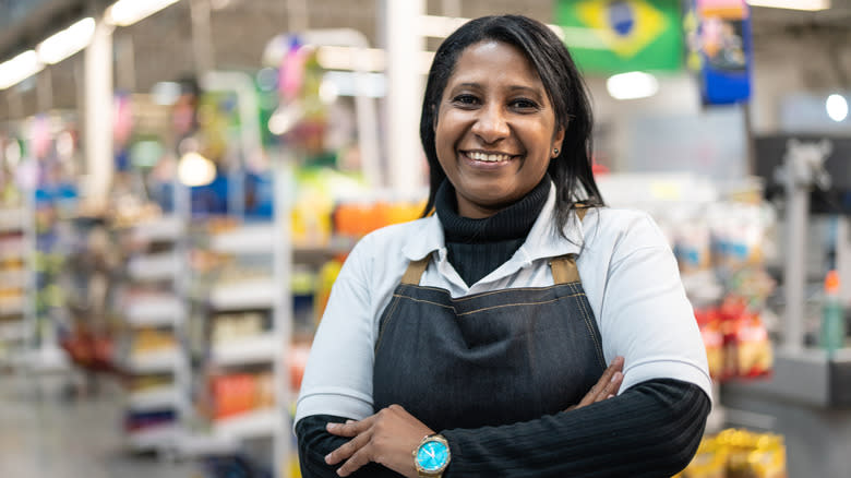 smiling employee in store