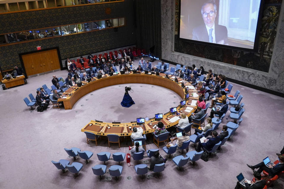 International Atomic Energy Agency (IAEA) Director General Rafael Mariano Grossi addresses the United Nations Security Council via video link during a meeting on threats to international peace and security, Thursday, Aug. 11, 2022 at U.N. headquarters. (AP Photo/Mary Altaffer)