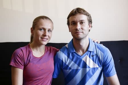 FILE PHOTO: Russian Olympian couple Yuliya (L) and Vitaly Stepanov pose for a picture before an interview with Reuters at an undisclosed location on July 28, 2016. REUTERS/Isaiah J. Downing