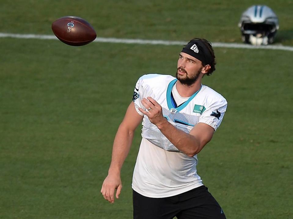 Carolina Panthers tight end Dan Arnold reaches to catch a ball on the field. Arnold has quickly become one of new quarterback Sam Darnold’s favorite targets in practice.