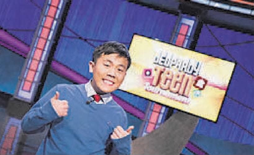 Jeff Xie, 17, of Edison, celebrates his win of $75,000 at the Jeopardy! Teen Tournament.
