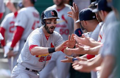 Matt Carpenter celebrates with teammates after hitting a home run on Sunday. (Getty)