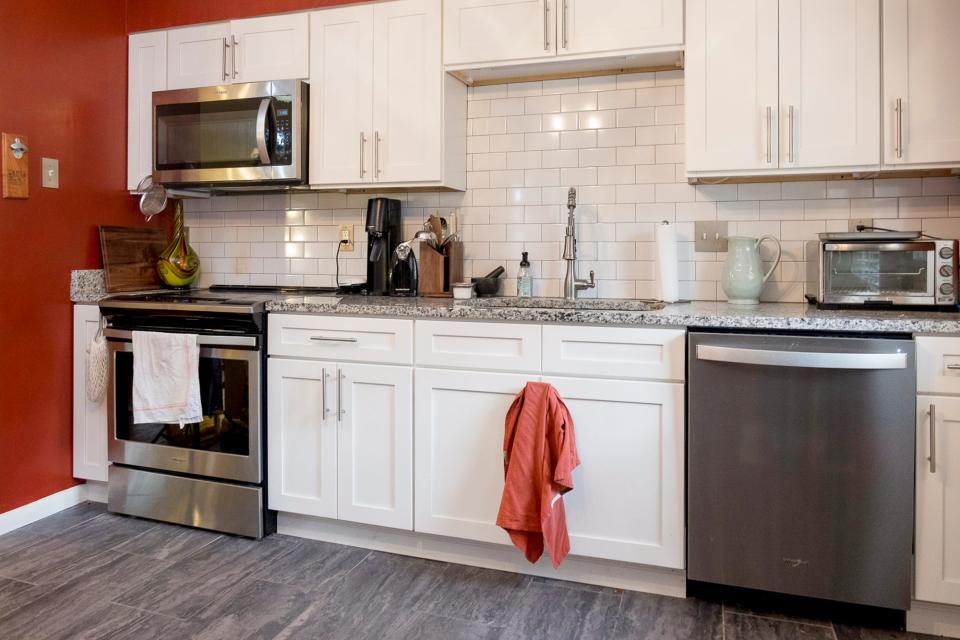 The kitchen is all new, thanks to renovations by a previous owner. There's new flooring, backsplash, cabinetry and appliances. The Sables added the new wall coloring.