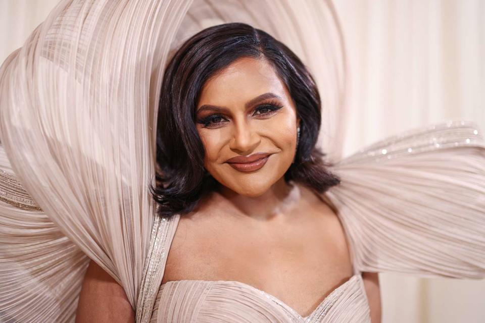 <p>Mike Coppola/MG24/Getty</p> Mindy Kaling attends the 2024 Met Gala on May 6, 2024