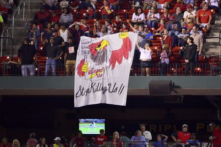 Sep 29, 2017; St. Louis, MO, USA; Protesters display a sign during the third inning of a game between the St. Louis Cardinals and the Milwaukee Brewers at Busch Stadium. Mandatory Credit: Jeff Curry-USA TODAY Sports