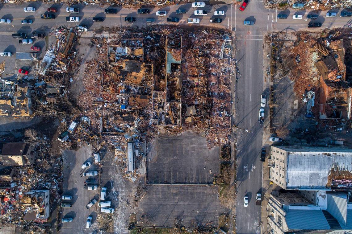Buildings are demolished in downtown Mayfield, Ky., on Saturday, Dec. 11, 2021, after a tornado traveled through the region the night before.
