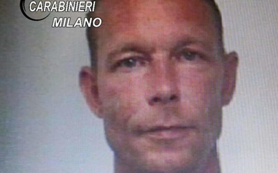 CORRECTION - A handout picture taken in 2018 and released by Italian Carabinieri on June 5, 2020 shows Christian B. when he was arrested for drug trafficking in Italy. -  - AFP