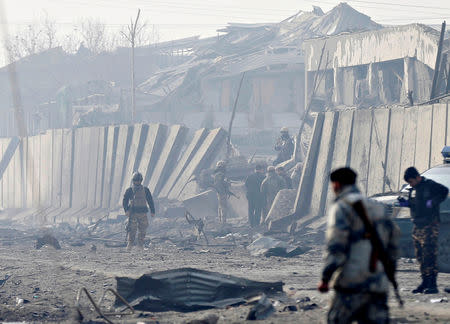 Afghan security forces inspect the site of a car bomb blast in Kabul, Afghanistan January 15, 2019. REUTERS/Mohammad Ismail