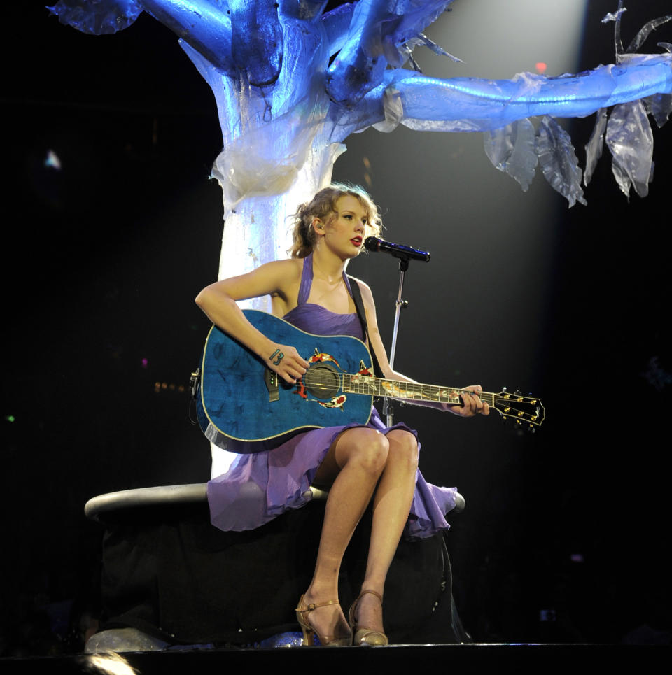 Taylor Swift Drops Koi Fish Pullover That Looks Just Like Her Last Kiss Guitar