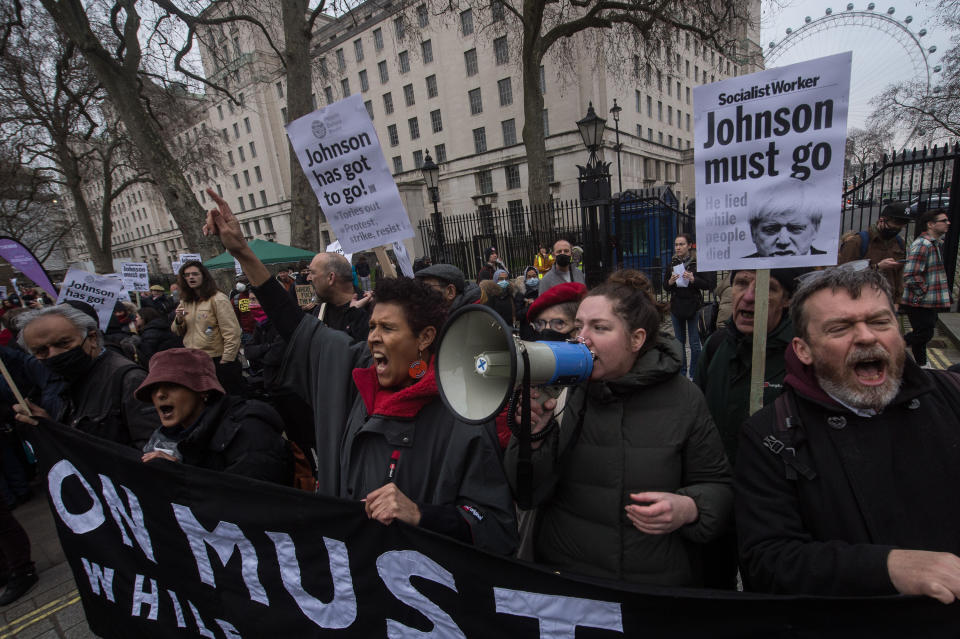 LONDON, ENGLAND - JANUARY 15: A protest called by People Before Profit demands the resignation of Boris Johnson at Downing Street on January 15, 2022 in London, England. (Photo by Guy Smallman/Getty Images)