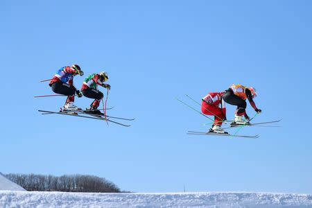 Freestyle Skiing - Pyeongchang 2018 Winter Olympics - Men's Ski Cross Finals - Phoenix Snow Park - Pyeongchang, South Korea - February 21, 2018 - Sergey Ridzik, an Olympic athlete from Russia, Kevin Drury of Canada, Brady Leman of Canada and Marc Bischofberger of Switzerland compete. REUTERS/Mike Blake