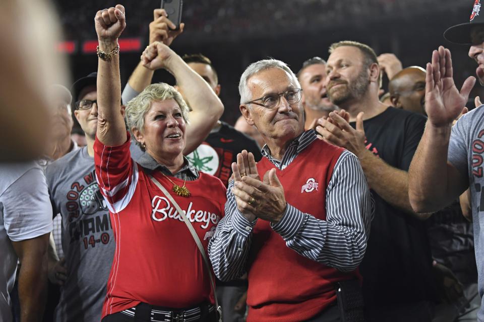 Former Ohio State head coach Jim Tressel watches a scoreboard tribute for the 2002 national championship team during the second quarter of a Buckeyes' game against Notre Dame, Saturday, Sept. 3, 2022, in Columbus.