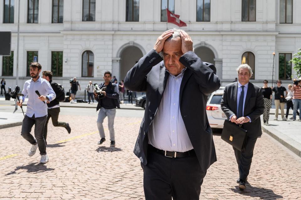 Former UEFA president Michel Platini leaves Switzerland's Federal Criminal Court after the first day of his trial over a suspected fraudulent payment in the southern Switzerland city of Bellinzona on June 8, 2022. - Sepp Blatter and Michel Platini, once the chiefs of world and European football start a two-week trial following a mammoth investigation that began in 2015 and lasted six years