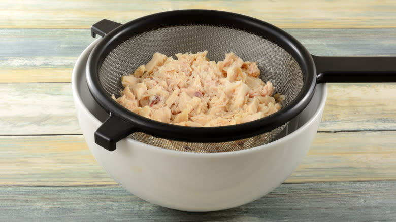 Tuna drained in a colander 