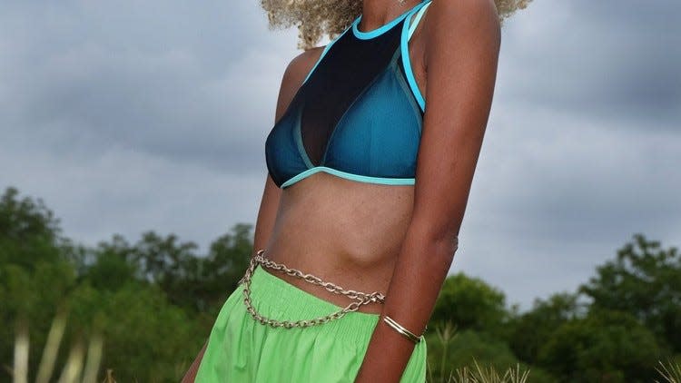 Melat says Zilker Park was the inspiration for this blue green look.