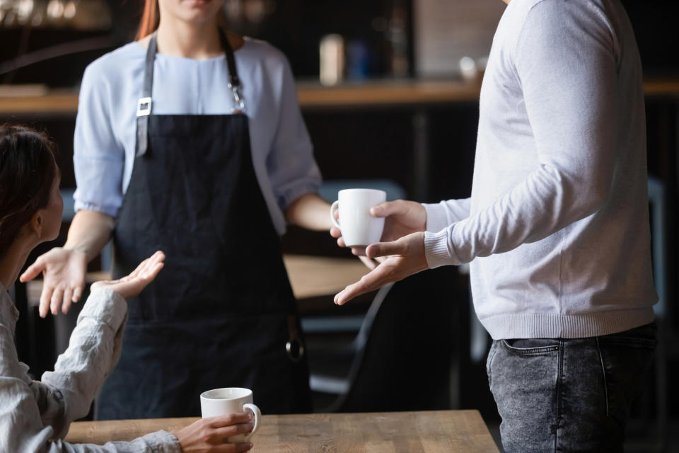 Service worker and customers arguing