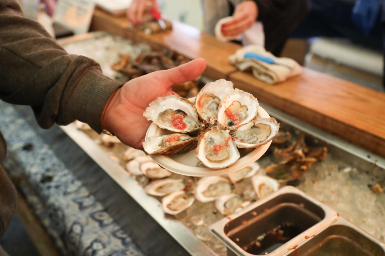 Oysters are shucked and ready for guests at the Bowen's Wharf Seafood Festival on Saturday.