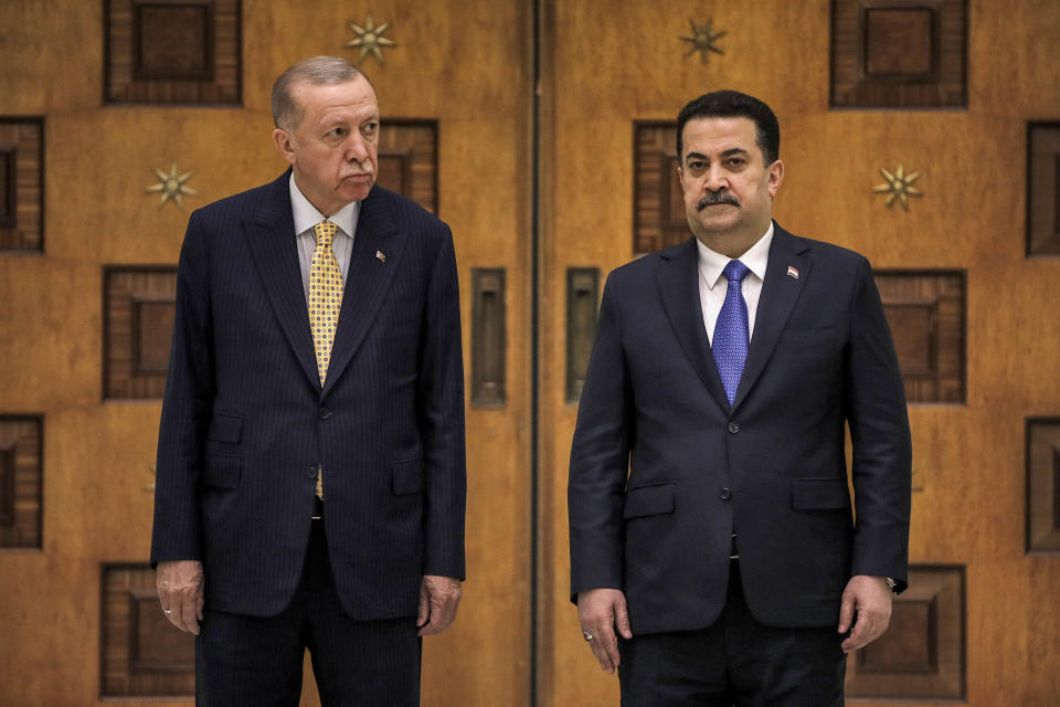 Iraq's Prime Minister Mohammed Shia al-Sudani, right, and Turkey's President Recep Tayyip Erdogan look on during their meeting in Baghdad, Iraq, Monday April 22, 2024. (Ahmad Al-Rubaye/Pool via AP)