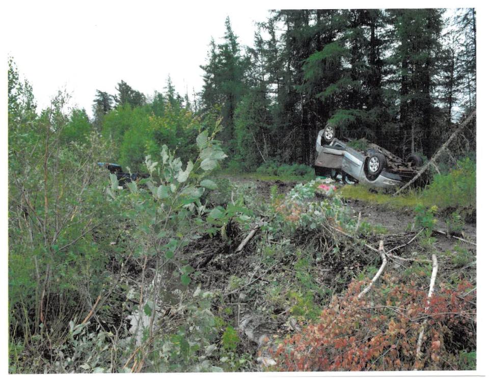 A photo of the scene entered as an exhibit shows where the truck, to the middle left, and the SUV ended up. 