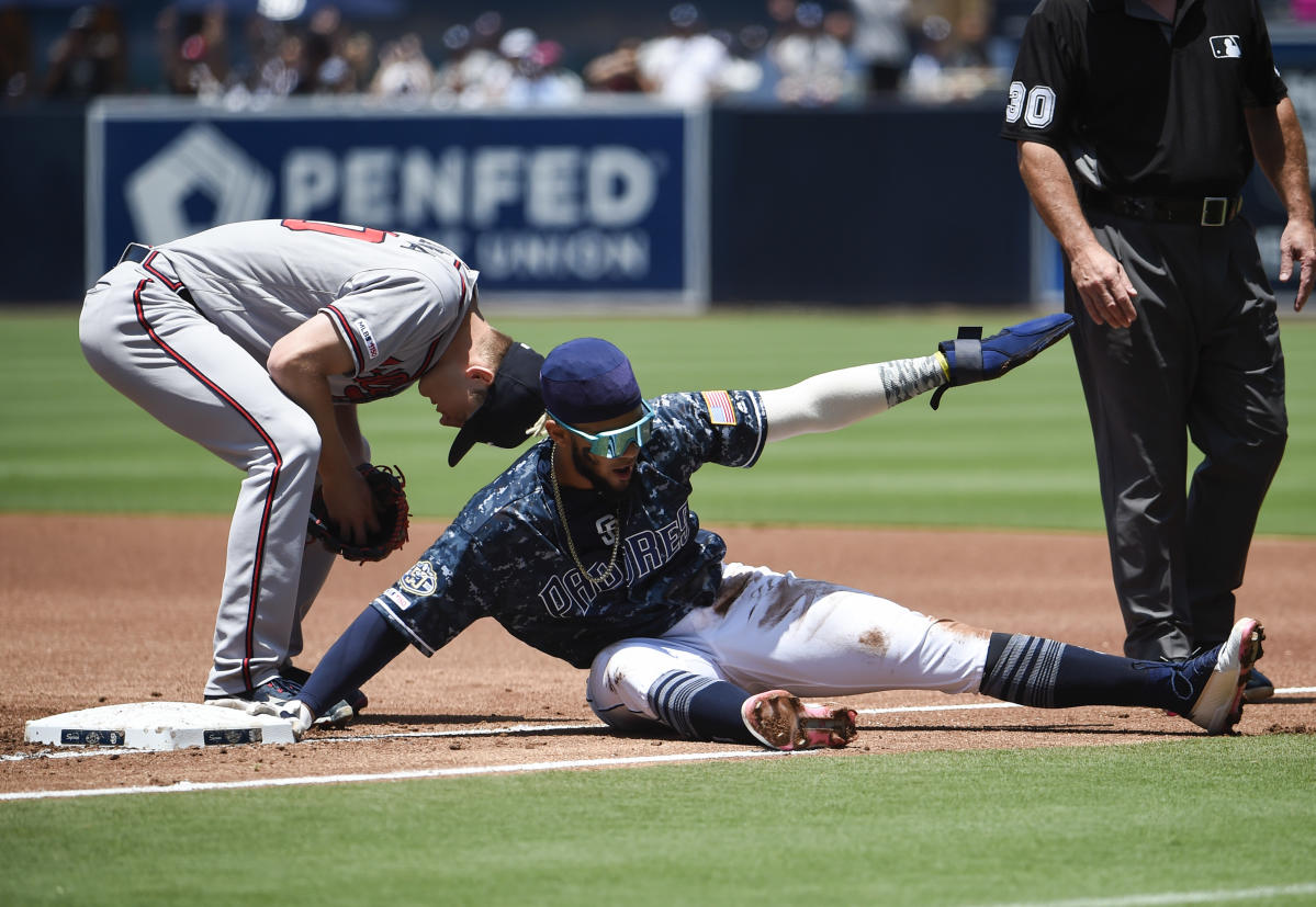 Padres star rookie Fernando Tatis Jr. evades pickle with incredible,  acrobatic slide