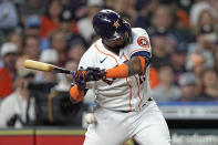 Houston Astros' Martin Maldonado is hit by a pitch thrown by Texas Rangers starting pitcher Glenn Otto during the fourth inning of a baseball game Wednesday, Aug. 10, 2022, in Houston. (AP Photo/David J. Phillip)