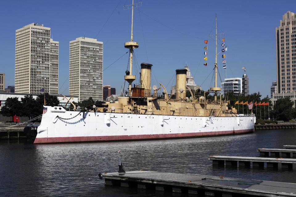 FILE- This Aug. 30, 2010 file photo shows the USS Olympia, which served as flagship of the Asiatic Squadron in the Spanish-American War, in Philadelphia. The USS Olympia, a one-of-a-kind steel cruiser from the Spanish-American War, has undergone extensive repairs that make it more stable than it has been in years as the field for prospective caretaker has narrowed to groups in San Francisco and South Carolina. (AP Photo/Matt Rourke, File)