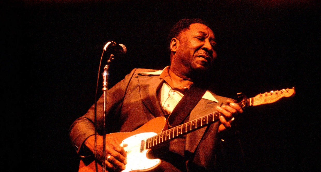  Muddy Waters with his iconic red Fender Telecaster. 