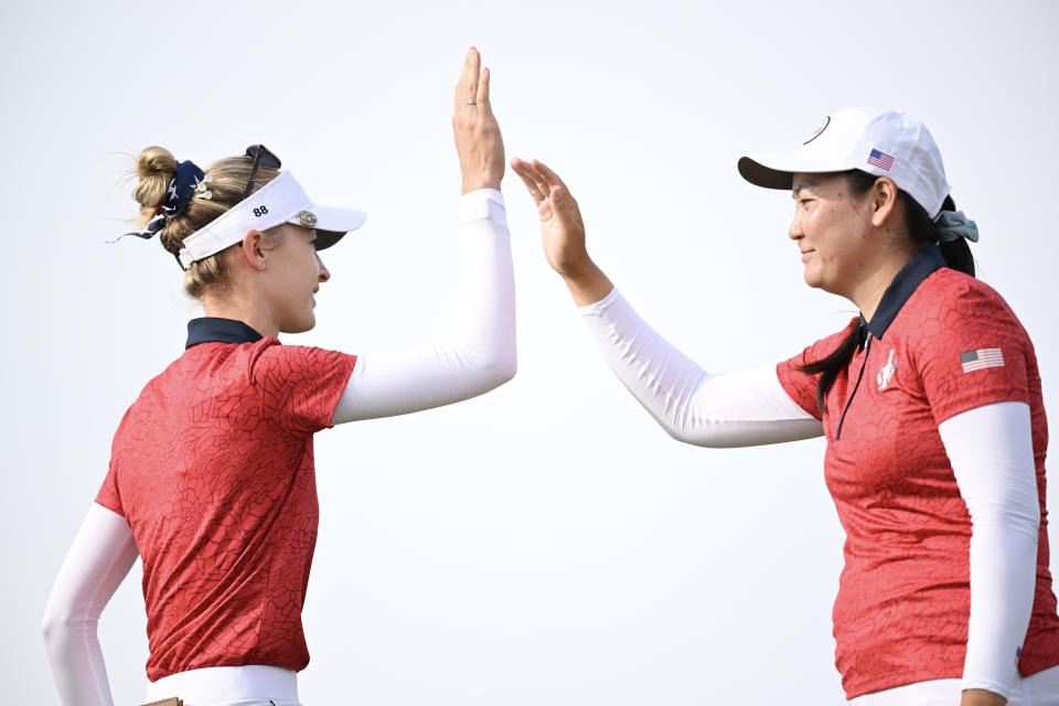 Nelly Korda and Allisen Corpuz of Team USA high five on the ninth green during Day One of The Solheim Cup at Finca Cortesin Golf Club on September 22, 2023, in Casares, Spain. (Photo by Stuart Franklin/Getty Images)