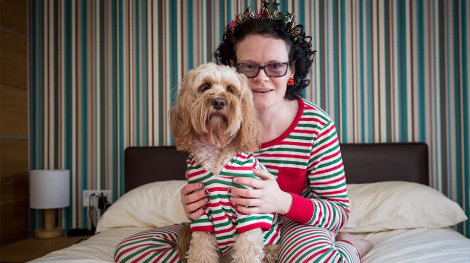 Helena Mueller and her beloved Cockapoo, Lola. Source: SWNS / Mega