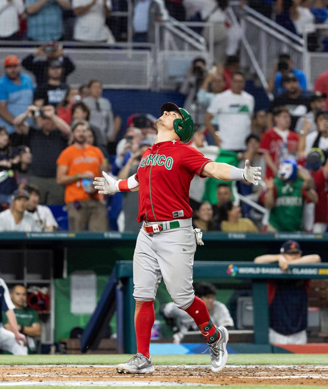 Mexico second baseman Luis Urias (3) celebrates after hitting a home run against Japan during the fourth inning of a semifinal game at the World Baseball Classic at loanDepot Park on Monday, March 20, 2023, in Miami, Fla.