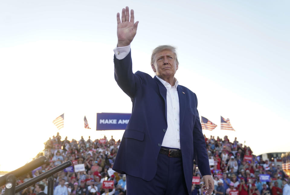 Former president Donald Trump gestures to the crowd during a campaign rally at Waco Regional Airport in Waco, Texas on Saturday, March 25, 2023. / Credit: Jabin Botsford/The Washington Post via Getty Images